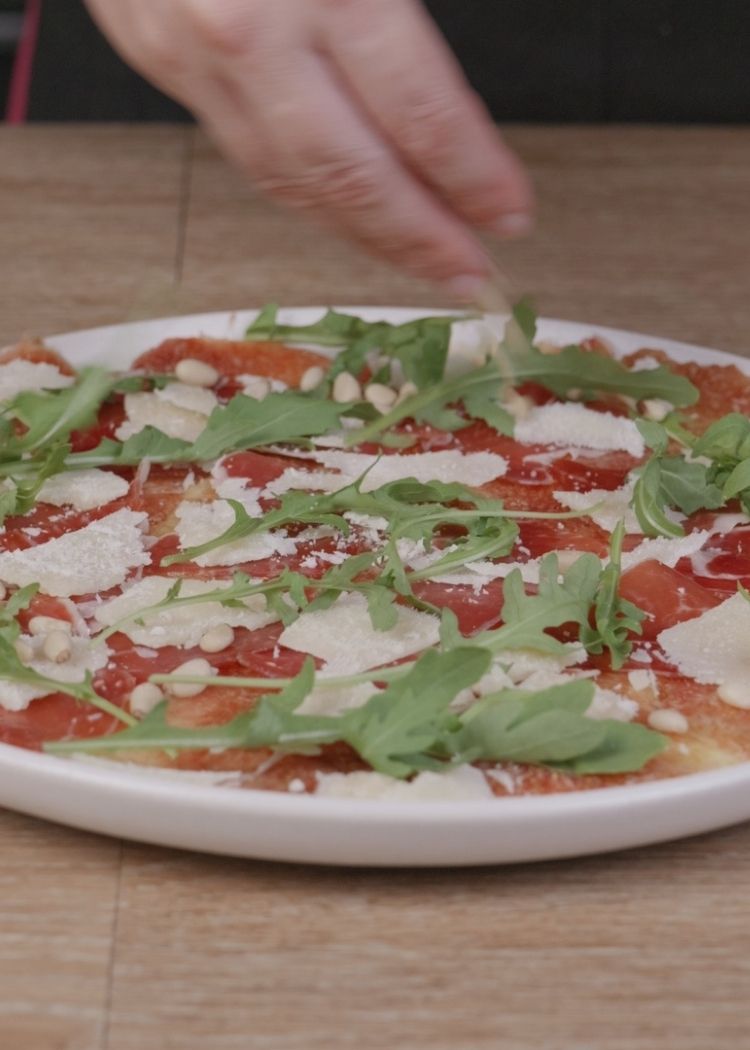 Añadir toppings a Carpaccio de higos