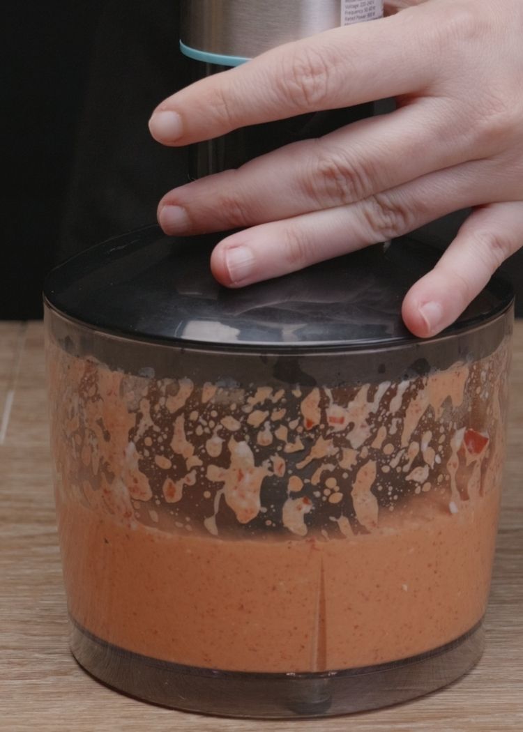 Triturar crema de piquillos